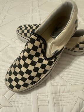 Vans Checkerboard Slip-On Sneakers in Black and Cream